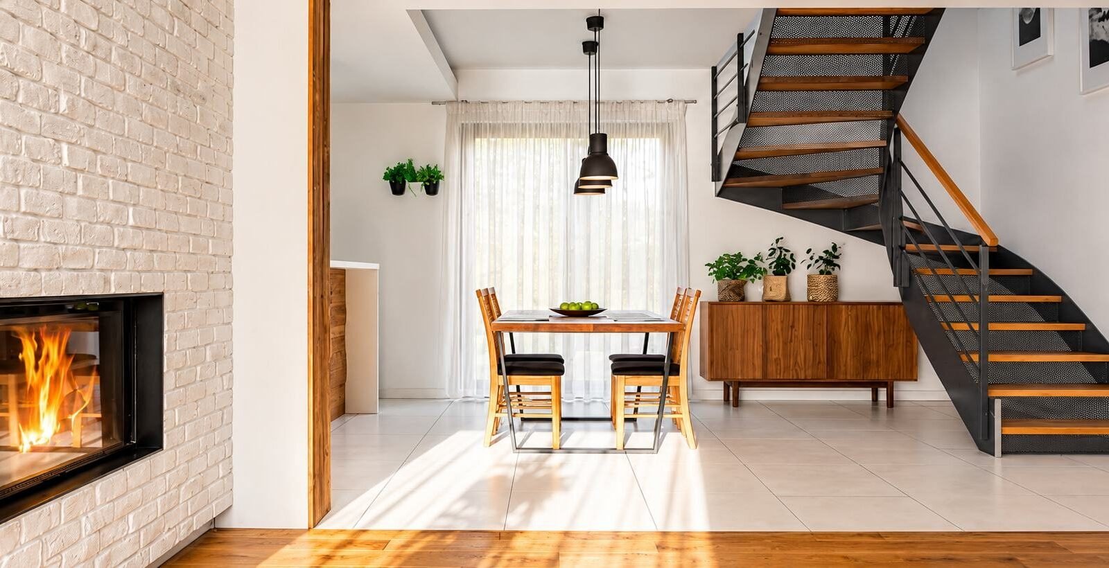 Open plan dining area with staircase