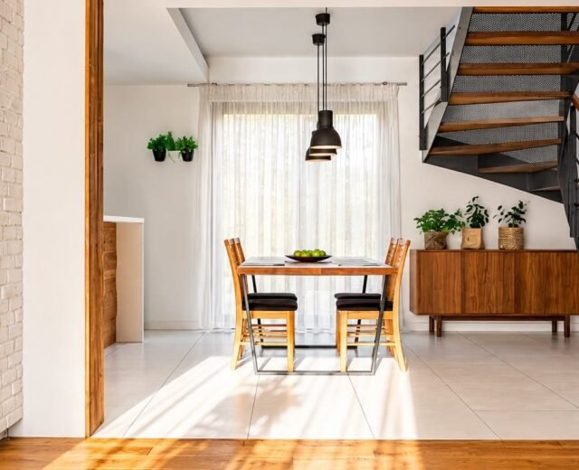 Open plan dining area with staircase